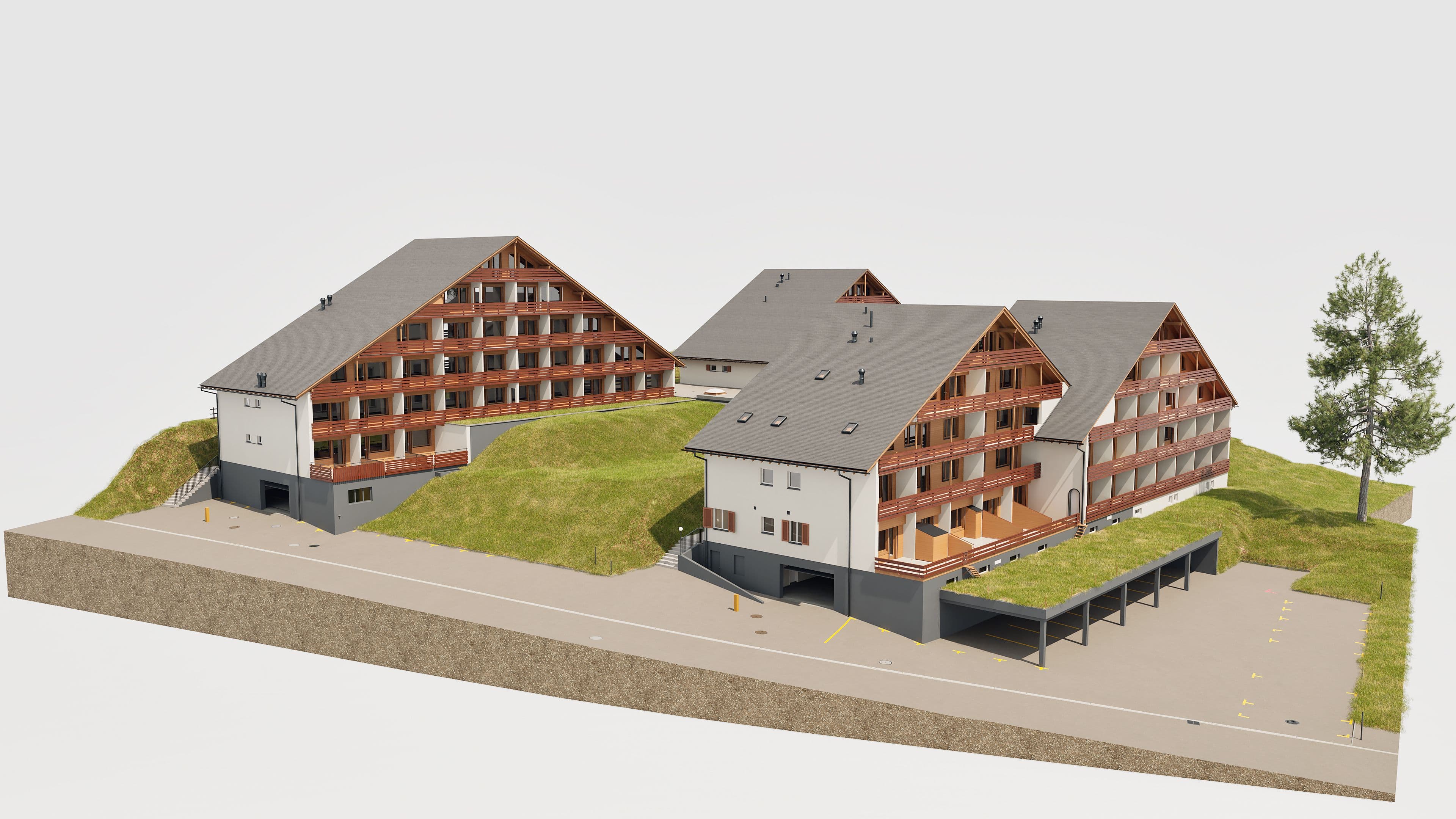 Modell von modernen Alpenchalets mit Parkplätzen und Begrünung.