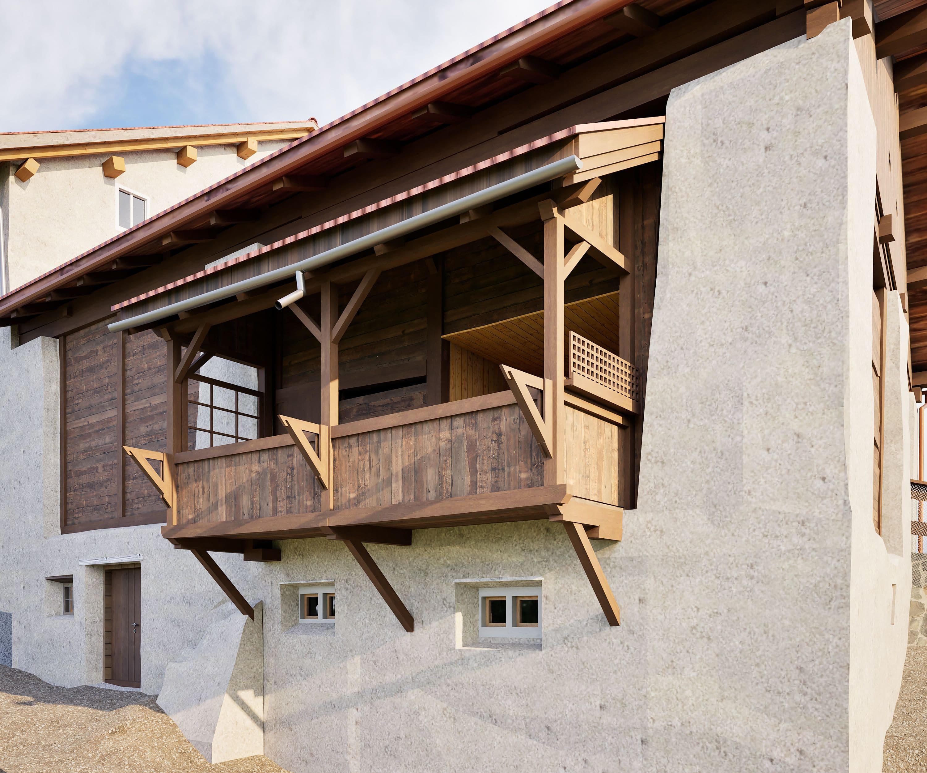 Historisches Gebäude mit weißem Putz und hölzernem Balkon, traditionelle Architektur und Schrägdach.